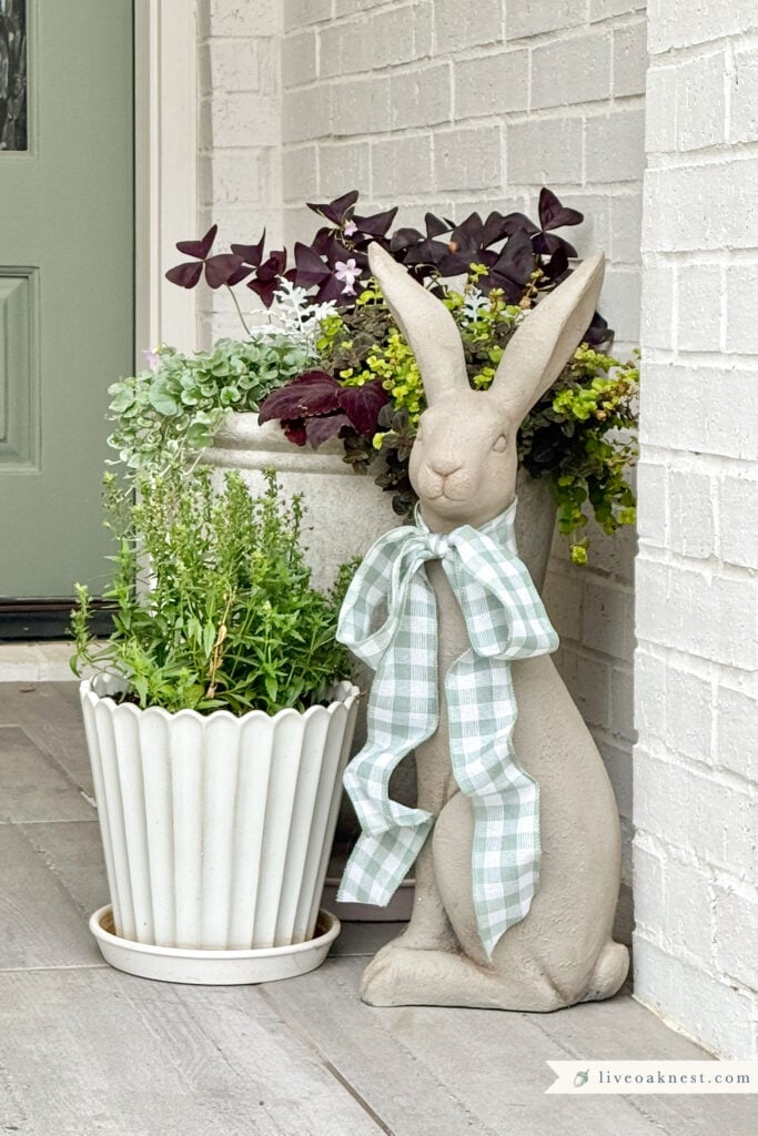small porch decor, potted plants, rabbit garden statue from Live Oak Nest